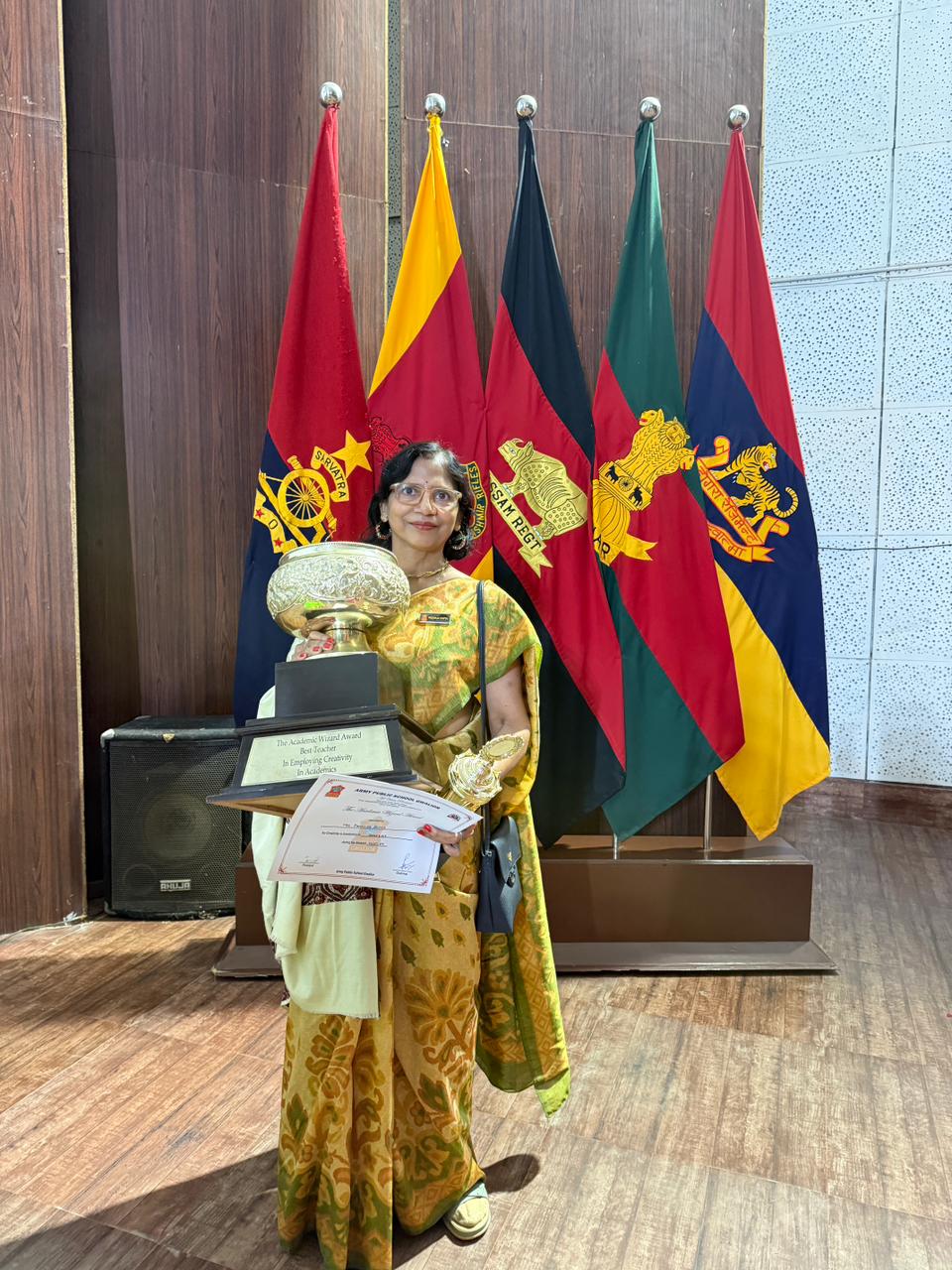Padmaja Gupta receiving an award and certificate