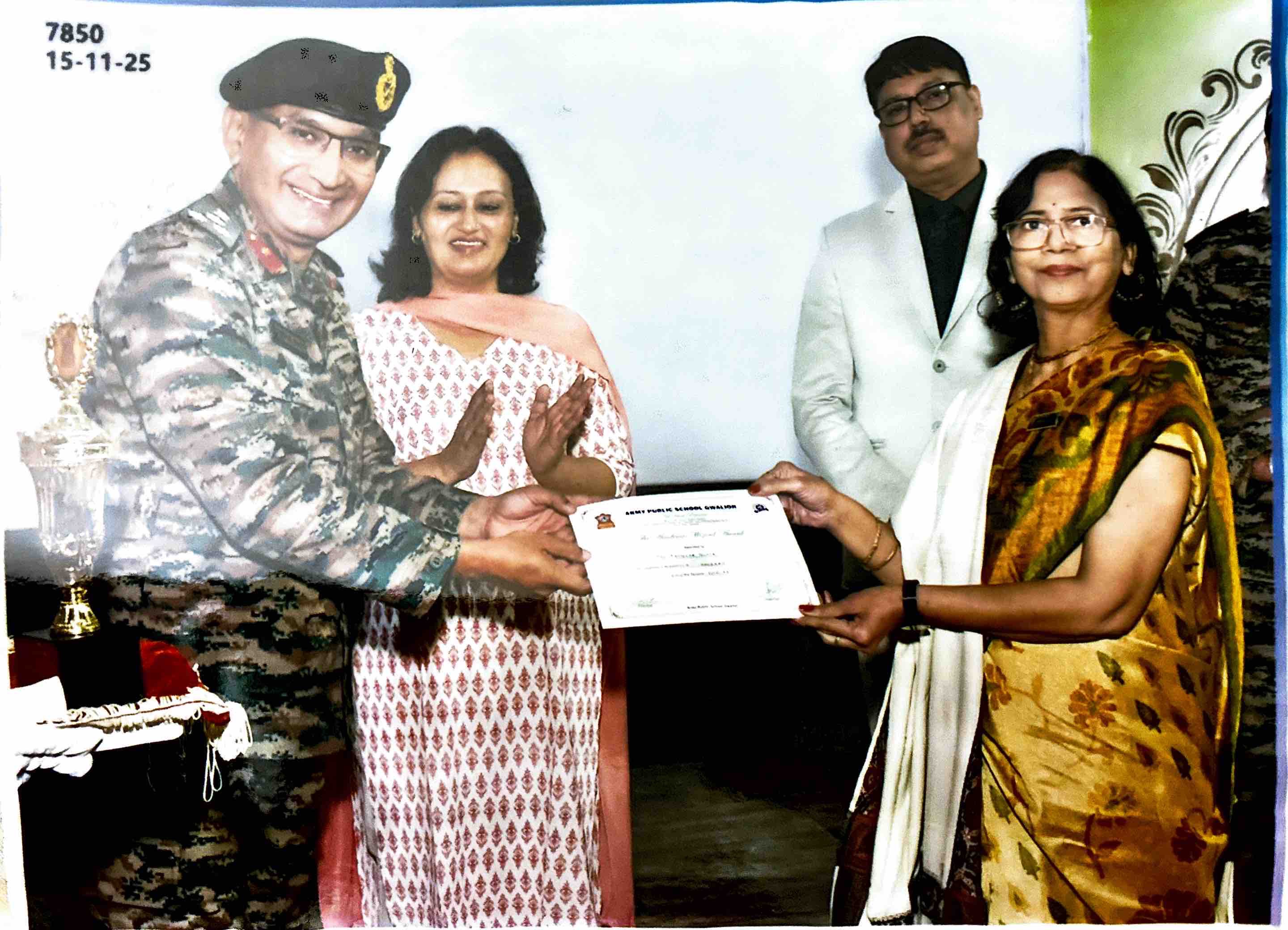 Padmaja Gupta receiving a certificate from an Army officer at Army Public School, Gwalior